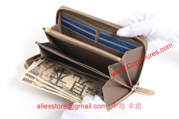 ルイヴィトン モノグラム ヴェルニ ジッピー・ウォレット 長財布 ベージュプードル M91761-1 【2012年新作】